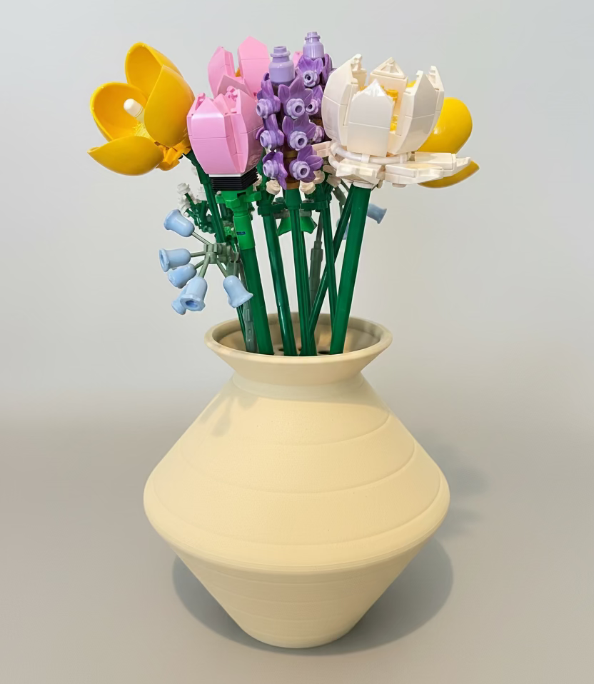 Vase with colourful flower arrangement 