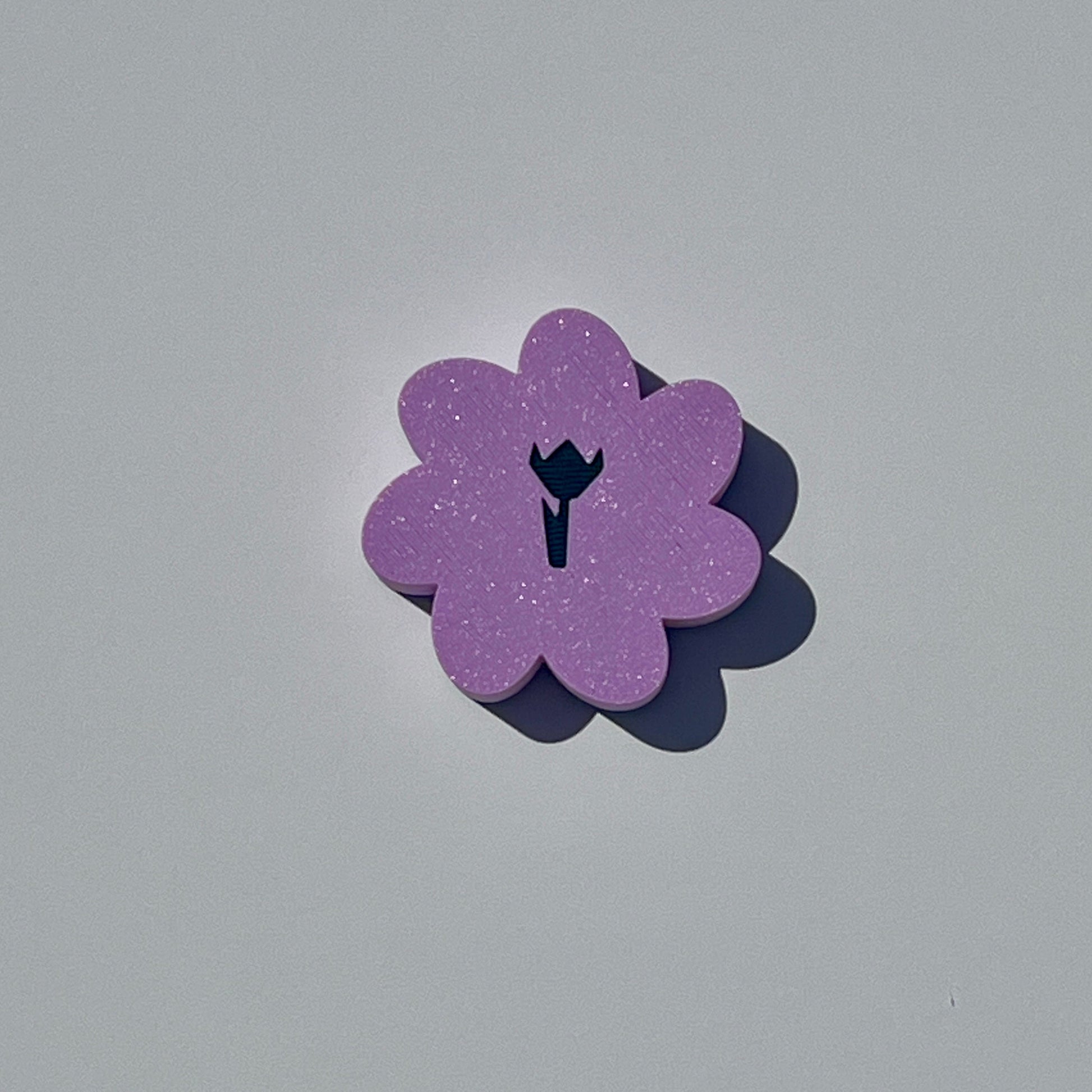 Lilac flower-shaped trinket dish with a contrasting central floral detail.