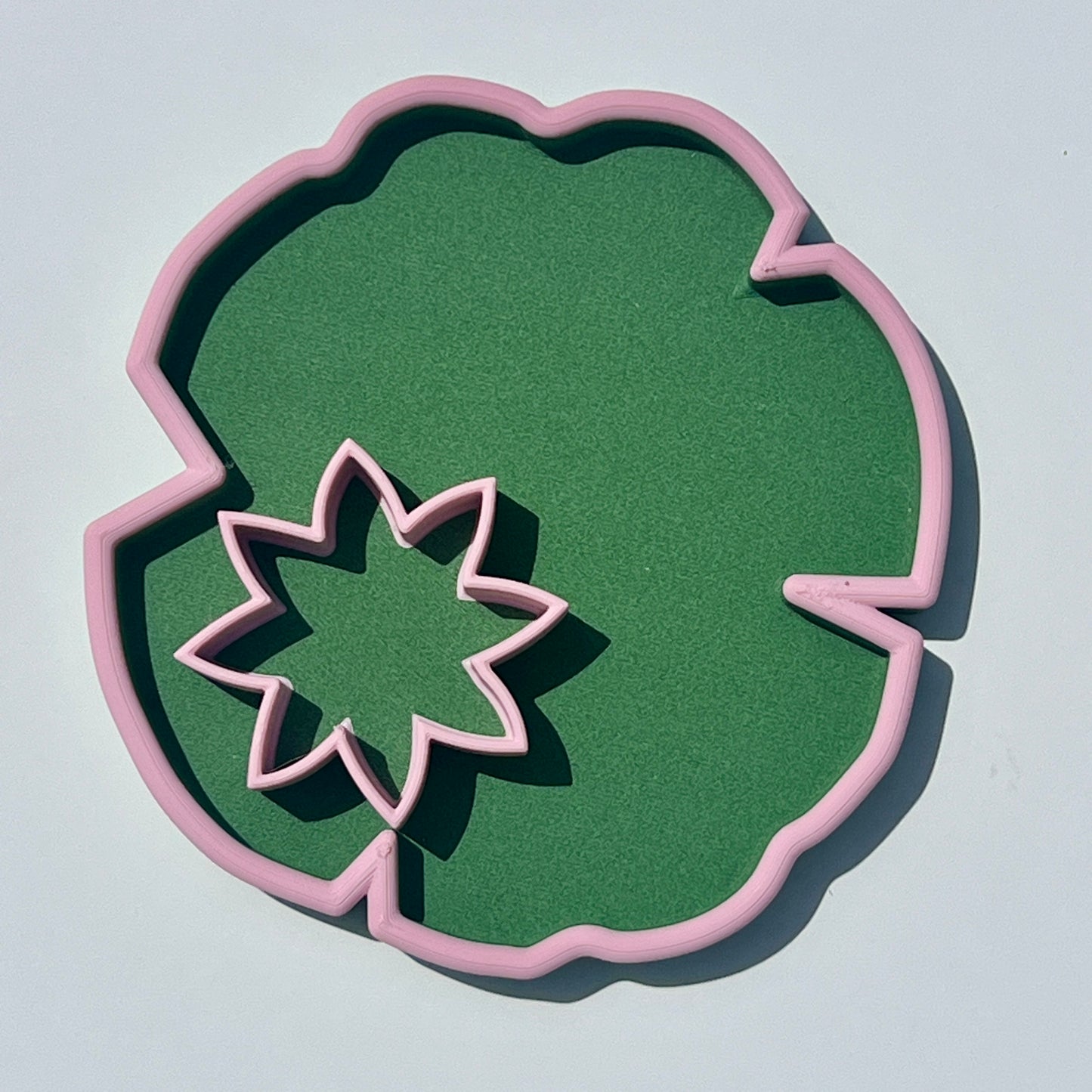 Matcha green lily pad trinket tray with sakura pink edging and a matching lily flower-shaped dish.