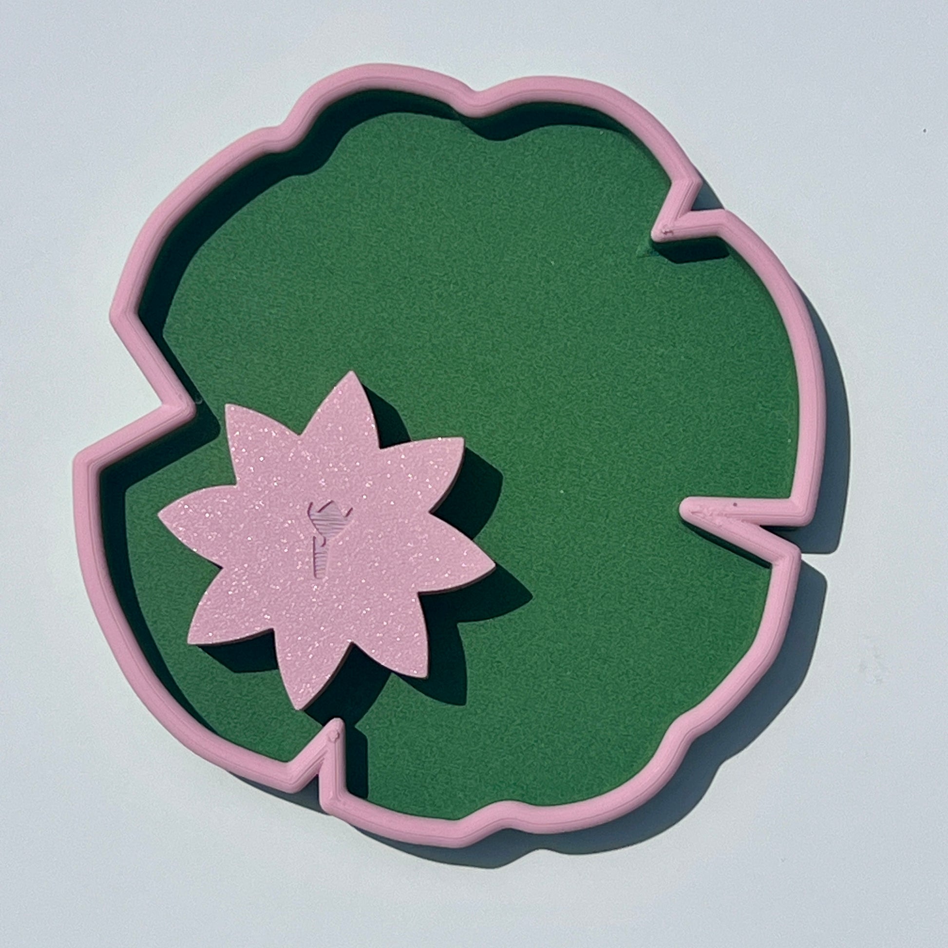 Nature-inspired lily pad trinket tray in matcha green with sakura pink edging and a matching flower-shaped mini dish.