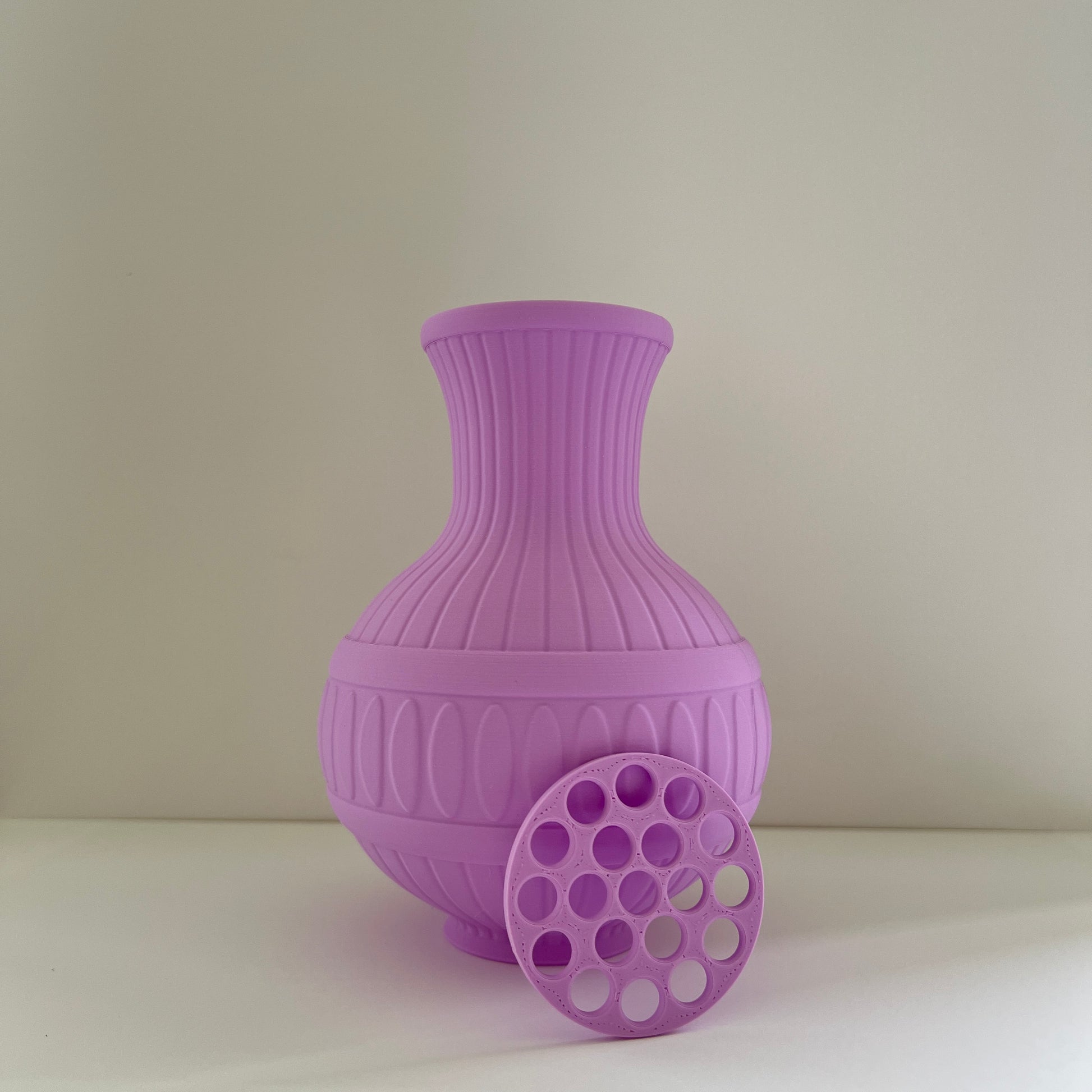 Purple textured vase on a light background