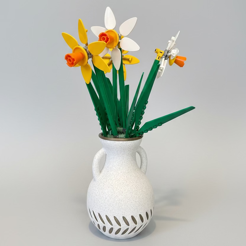 White vase with cutout design containing artificial flowers 