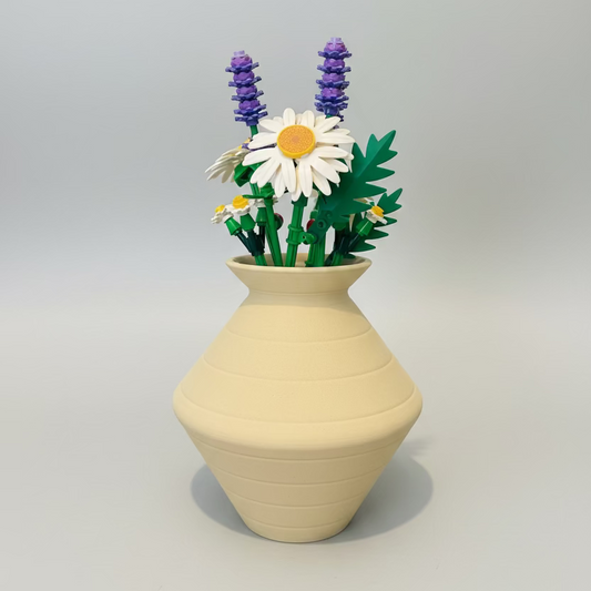 Beige vase with artificial flowers