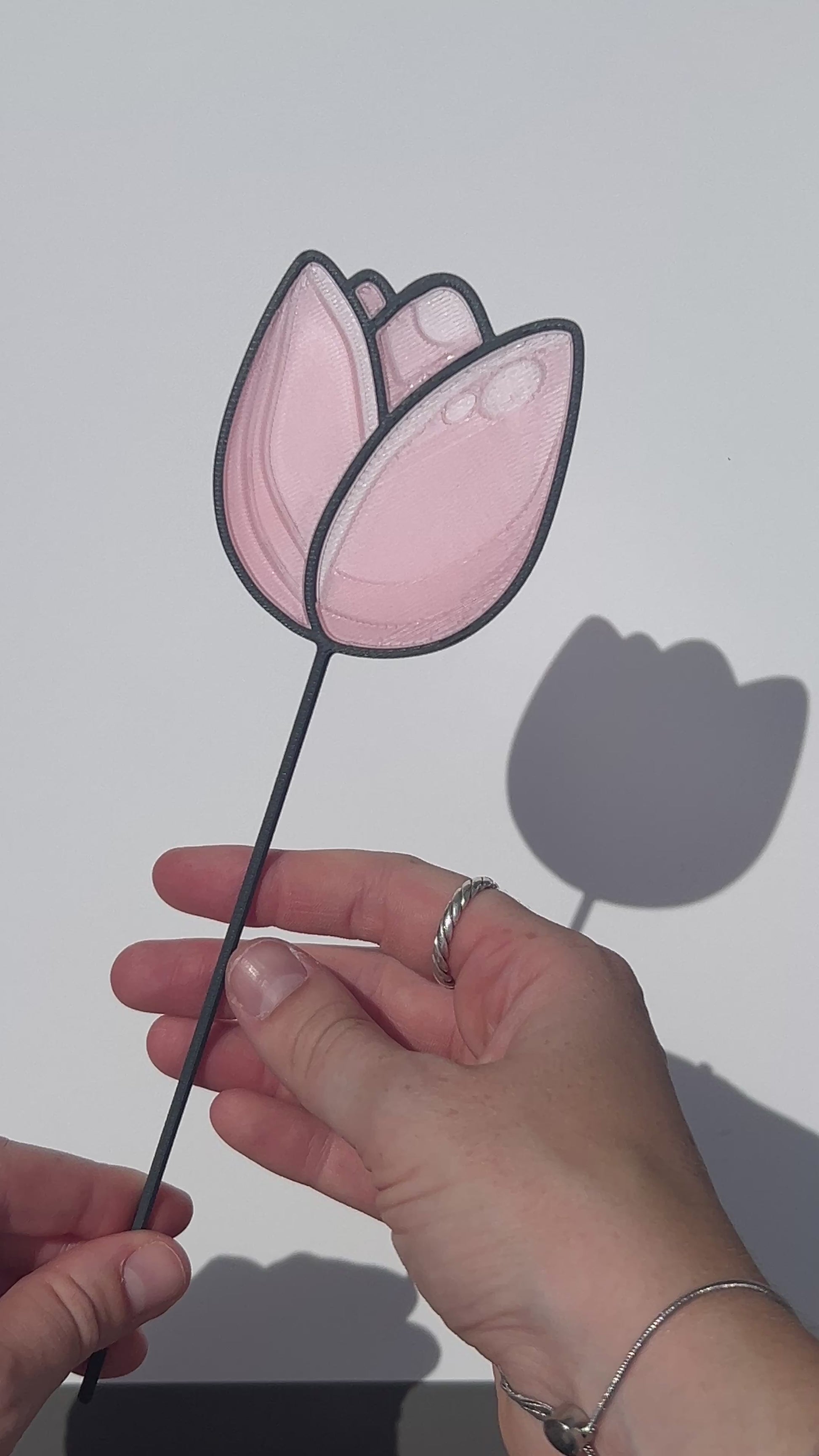 Pink translucent PLA tulip decorative stem with a black stained-glass-inspired outline.