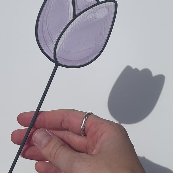 Lilac translucent PLA tulip decorative stem with a black stained-glass-inspired outline.