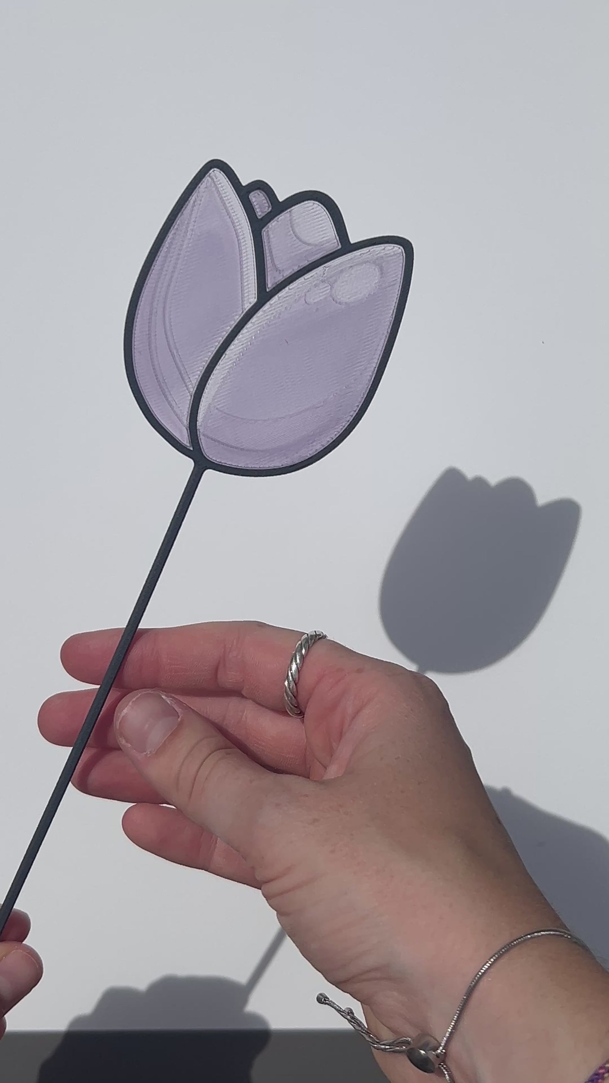 Lilac translucent PLA tulip decorative stem with a black stained-glass-inspired outline.
